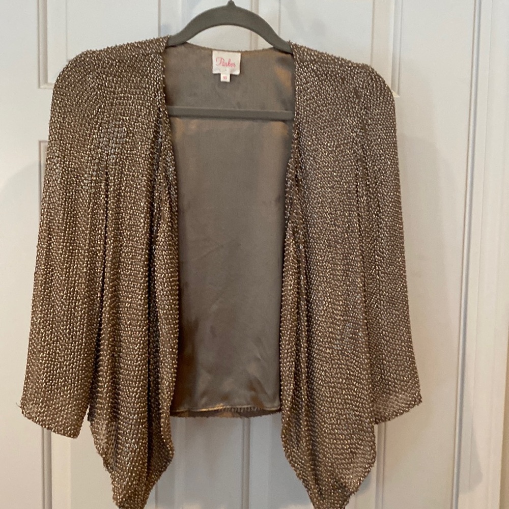 Dressy short beaded jacket size XS. Tan/gold color